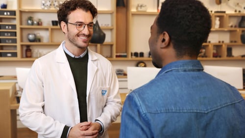 Eye doctor and patient