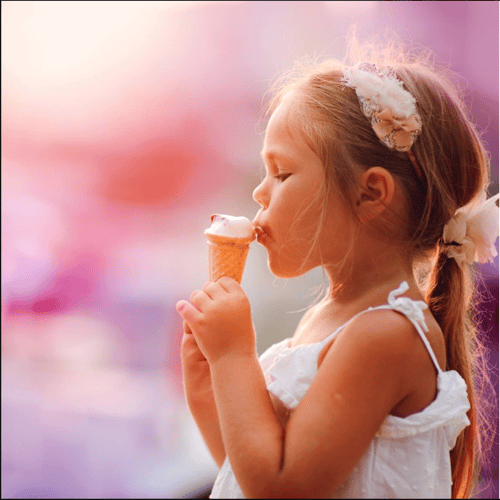 Child eating ice cream at Sweet Scoops in Kemah, TX