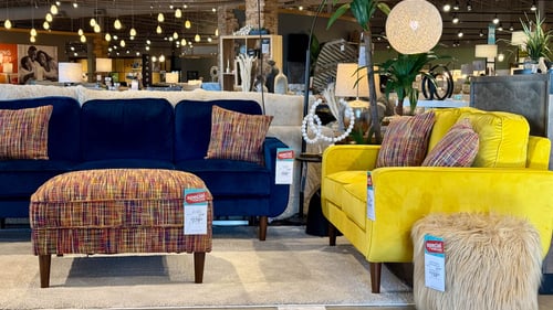Woodbury Slumberland Furniture matching colorful sofa and accent pillows
