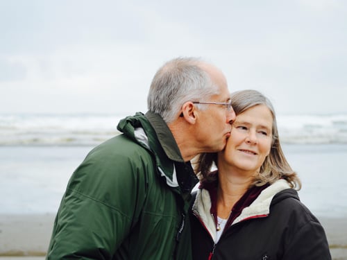 A senior couple on a beach.