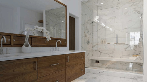 large bathroom with a big sink and shower
