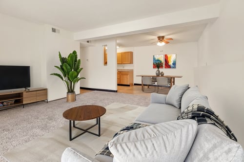 Living room and dining area at Winding Hills Apartments in Davenport, IA 52807