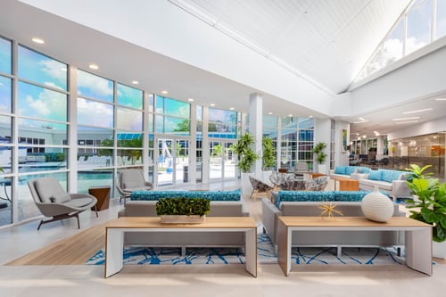 Gaze out at the pool from our bright lobby in Kissimmee.