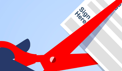 scissors cutting a tax return