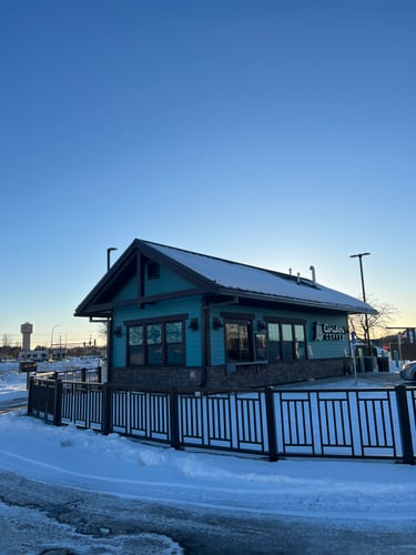 Storefront of the Caribou Coffee at 2051 Washington Ave in Stillwater