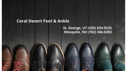 Four pairs of men's dress shoes displayed in a row across hardwood flooring