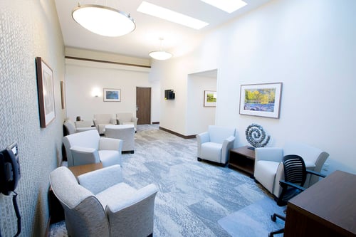 Men and women are housed in separate residential wings, with 8 to 12 rooms per wing. Each wing has its own living space with comfortable seating and televisions.