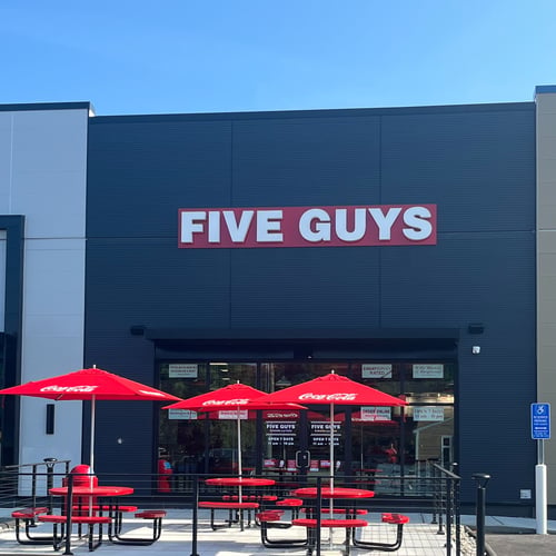 Exterior photograph of the Five Guys restaurant in Killingly Conn.