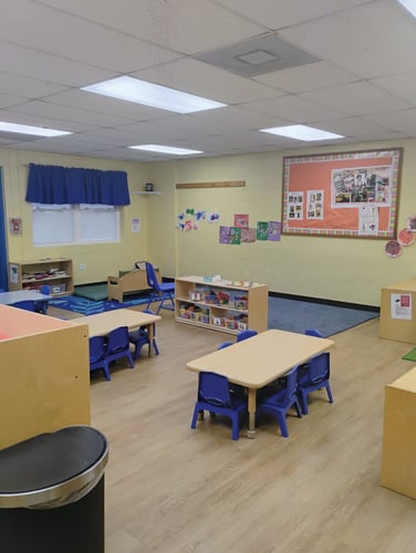 Bright, toddler-friendly room filled with toys, sensory activities, and soft play areas for little explorers.