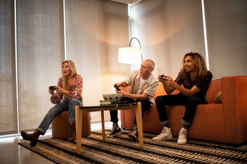 Friend gaming in the house