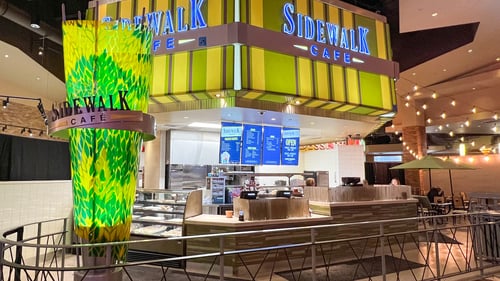Sidewalk Cafe at Horseshoe Indianapolis. No matter what you’re craving, you’ll be sure to satisfy your appetite at Sidewalk Café at Horseshoe Indianapolis. This Indianapolis grab-and-go restaurant has everything from burgers to baked goods. Just steps away from the bustling casino, Sidewalk Café has something for everyone. Take your food to-go or grab a seat and enjoy people-watching. Go healthy with a salad or indulge with loaded nachos or pizza. Sidewalk Café is also open for breakfast.