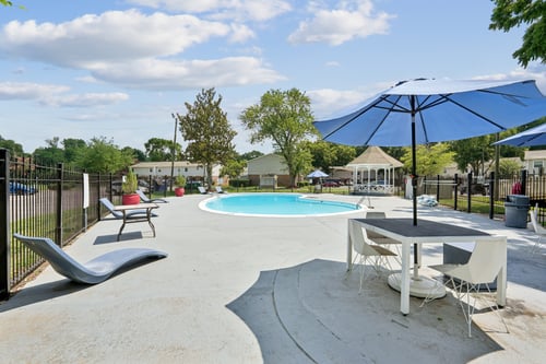 Property exterior with a pool area at Windsor Harbor, Charlotte, NC.