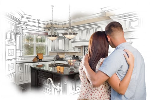 Young couple imagining a remodeled kitchen