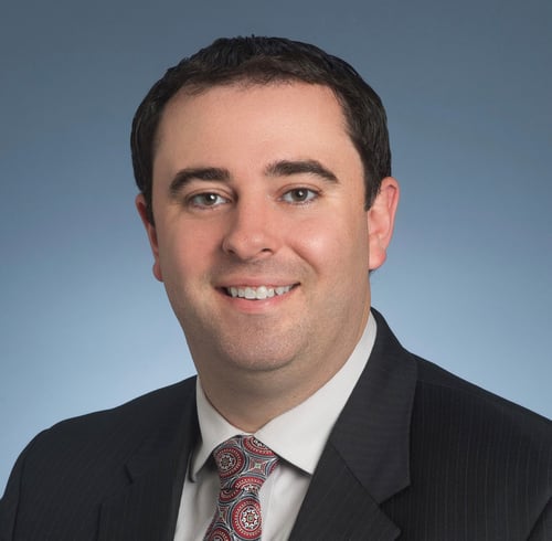 A headshot of Ryan Ives