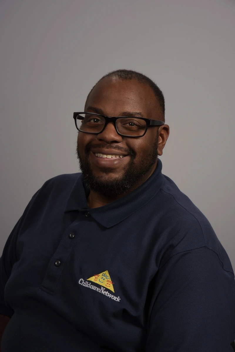 Headshot of School Director Victor DeMarcus Moore