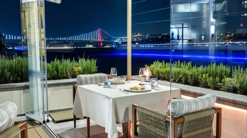 View of the dining room at Aqua Restaurant in the Four Seasons Hotel Istanbul qt the Bosphorus