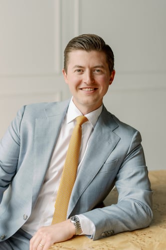 Cole Heideman Investment Advisor sitting at desk