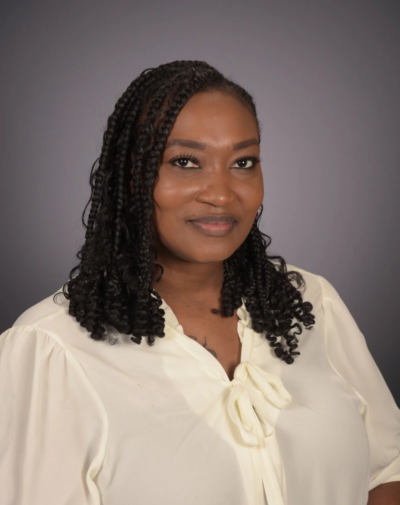 Headshot of School Director Charlesha Ellis