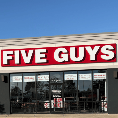 Exterior photograph of the Five Guys restaurant at 244 14th Street in Dickinson North Dakota.