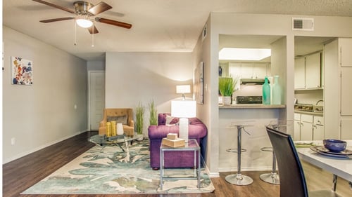 Dining room and kitchen room at Newport Apartments in Irving, TX