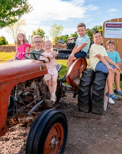 kids sitting on tractor