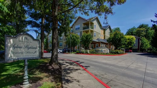 Property sign at Commons at Sylvan Highlands Apartments in Portland, OR 97225