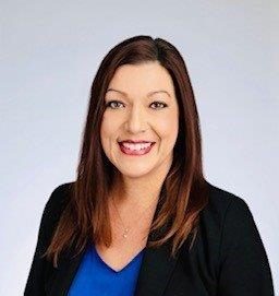 A headshot of Andrea Gilbert.