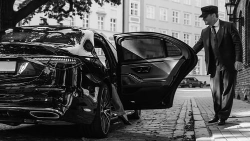 Driver Holding Door Open