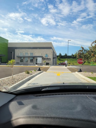 Storefront of the Caribou Coffee at 1275 Bell Ave in Hartford