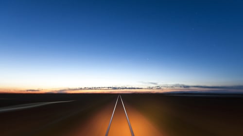 An empty road at dusk.