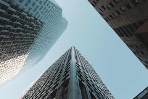 Low angle photo of skyscrapers and sky