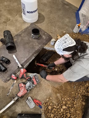 a bluefrog Plumber repairing a section of sewer lateral underneath a concrete slab