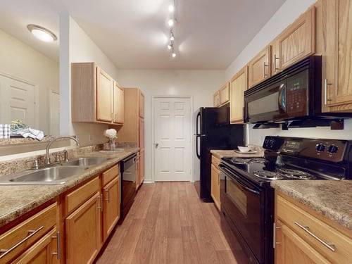 Gorgeous renovated kitchens available with updated counters and cabinetry at Parc 1346 Apartments, Chattanooga, TN 37421