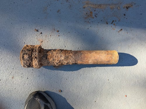 Corrected shower and bathtub ABS sewer line piping, and replaced an internally corroded piece of vertical cast iron pipe