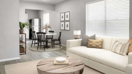 a living room with a couch and a coffee table in front of a dining room table  at Sunset Heights, Texas