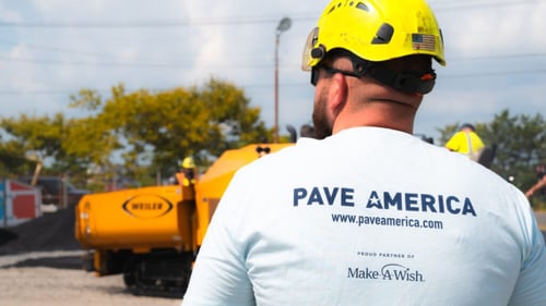 paving contractor wearing a shirt highlighting turner asphalt's partnership with make-a-wish