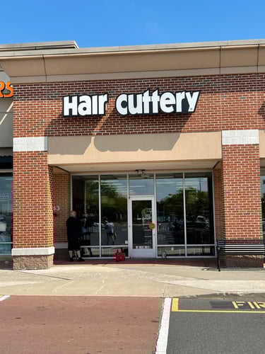 The front entrance of Hair Cuttery at Hamilton Marketplace.