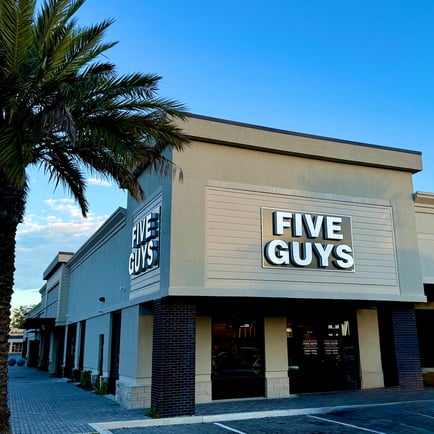 Exterior photograph of the Five Guys restaurant at 4495 Roosevelt Boulevard in Jacksonville Florida.