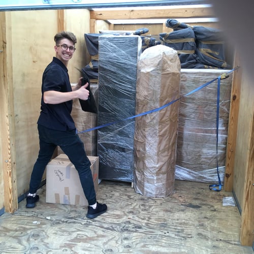 Our crew member making sure that the goods are strapped properly