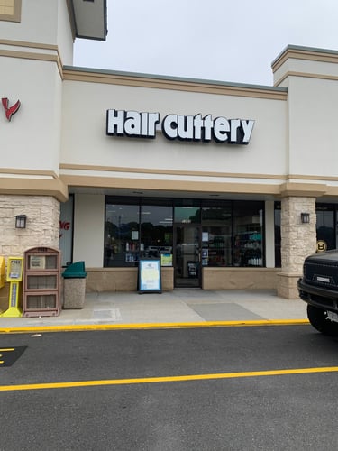 The front entrance of Hair Cuttery at Great Neck Village.