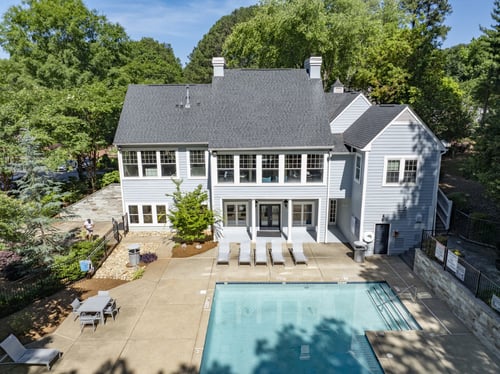 Aerial View of Apartment Building and Swimming Pool at Manchester at Mansell in Roswell, GA