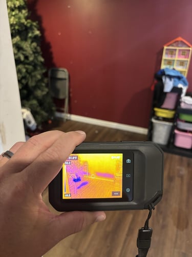 Using an infrared camera to help find water hiding behind a wall