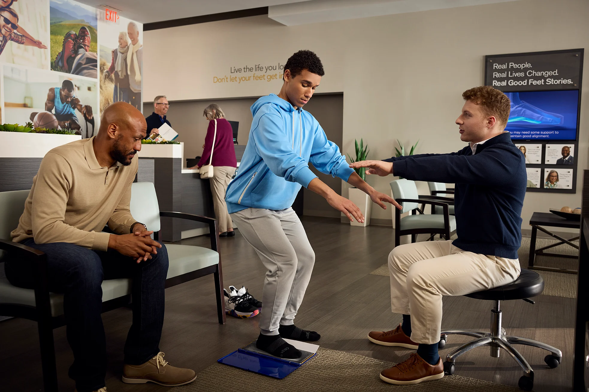 Customer getting personally fitted in-store for Good Feet arch supports