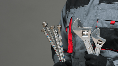 close up of a tool belt with tools