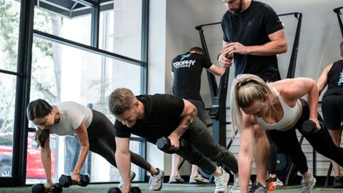 Members participating in small group training at the best gym in Uptown Dallas.