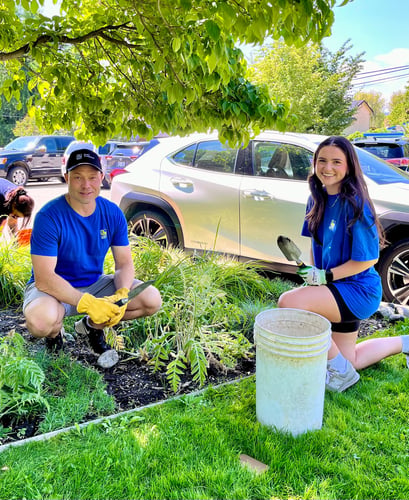 Wade and Shaina volunteering in the garden at COHA
