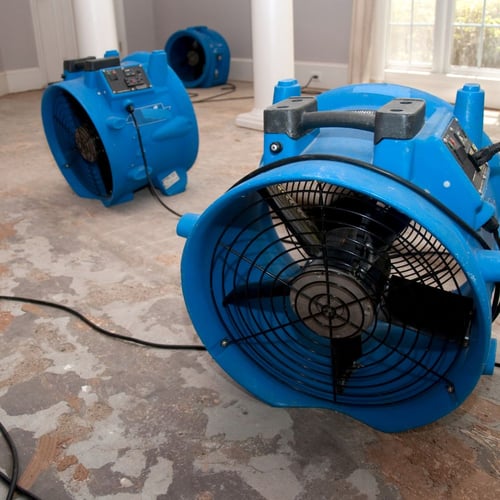 Crew restoring a water-damaged commercial property