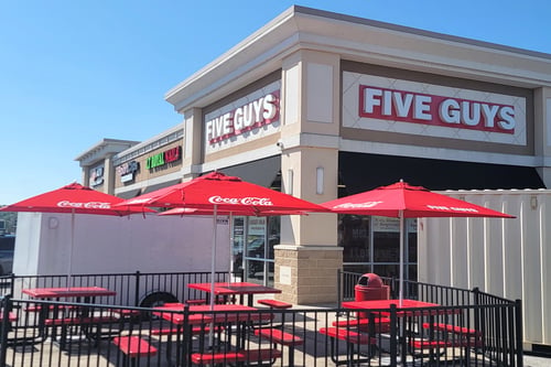 Exterior photograph of the Five Guys restaurant at 5399 South US Highway 41 in Terre Haute, Indiana.