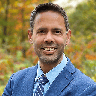 Headshot of Nicky K. Tahil