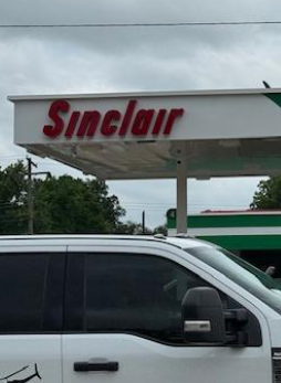 Sinclair gas station fueling island
